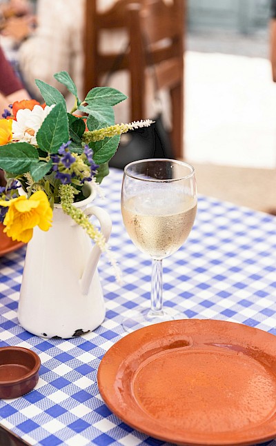 Wine and flowers. Unsplash@Micheile Henderson