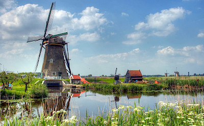 19 windmills make up Kinderdijk, South Holland, the Netherlands. Photo via Flickr:John Morgan
