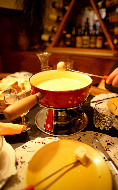 Cheese fondue is a Swiss tradition! Flickr:Ashley Deason