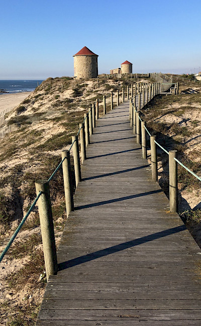 Boardwalk to beach in Esposende in northern Portugal. Flickr:Sergei Gussev