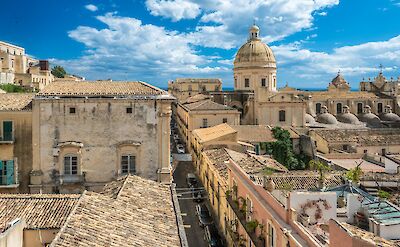 Rooftops and domes surrounding Noto Cathedral. Flickr:MichaelGaylard