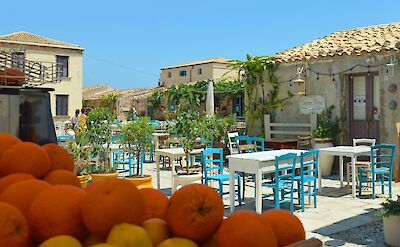 Outdoor caf&eacute;s in Piazza Regina Margherita, Marzamemi. pixabay:pieraverara