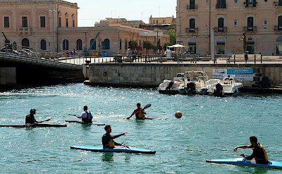 Kayakers in Syracusa, Sicily, Italy. Flickr:Antti Tnissines
