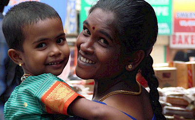 Motherly love in Kerala, India. Flickr:Koen