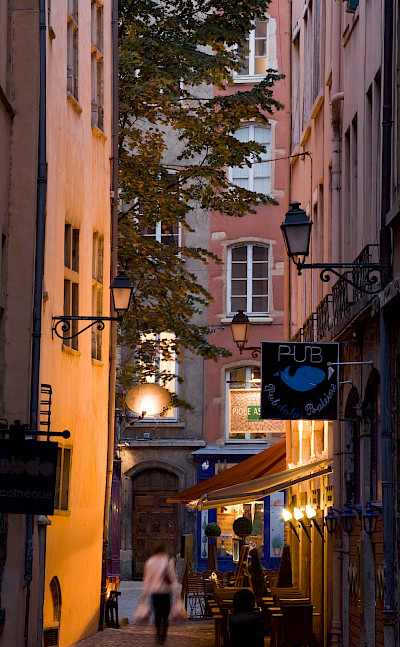 Cafes line the streets in Lyon, France. Photo via TO