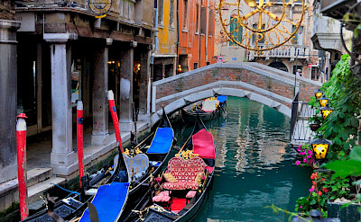 Gondolas await in Venice, Italy. Flickr:gnuckx