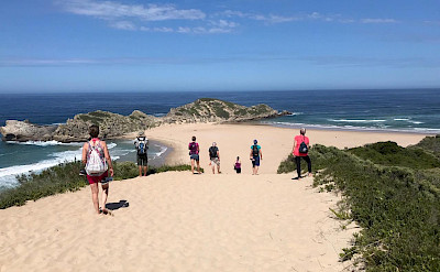 Hennie and group enjoying the beaches on the Garden Route in South Africa.