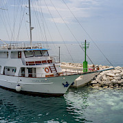 Pape Prvi moored and waiting for you for Bike & Boat Tour in Southern Dalmatia, Croatia.