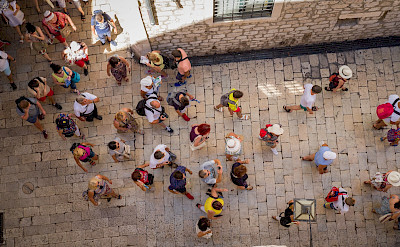 Tourists exploring in Dubrovnik, Croatia. Flickr:Luca Sartoni