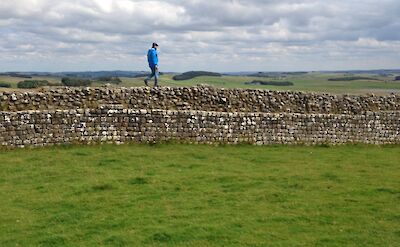 Walking along Hadrian's Wall in Cumbria, England.