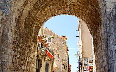 Hiking past the medieval walls in Dubrovnik, Croatia. Flickr:Dennis Jarvis