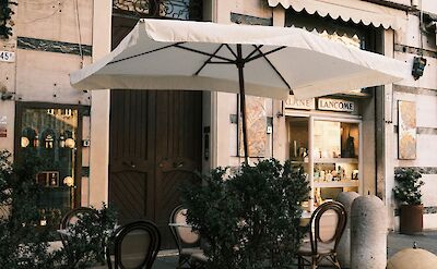 Cafe in Modena, Italy. Unsplash@Grigorii Shcheglov