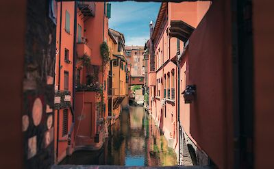 Canal in Bologna, Italy. Unsplash@Daniel Sessler