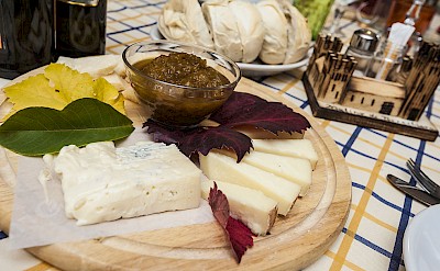 Cheese tasting platter featuring regional specialties. to-BTP