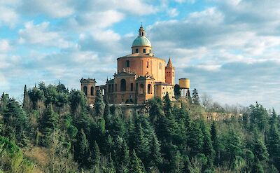Church on a hill in Bologna, Italy. Unsplash@Constantin Mutaf