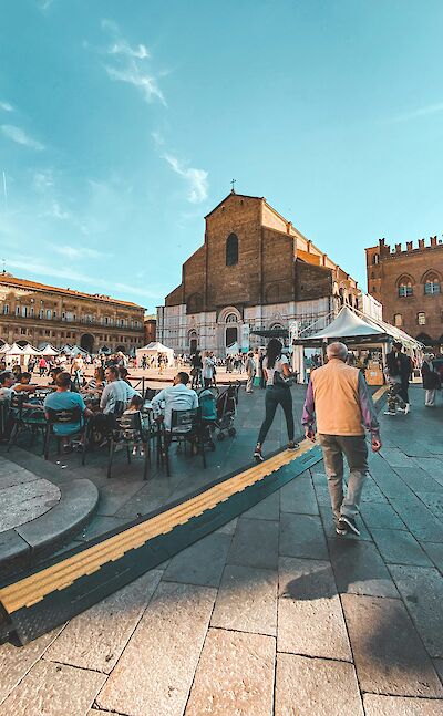 Eating in the square, Bologna, Italy. Unsplash@Khaled Bahar