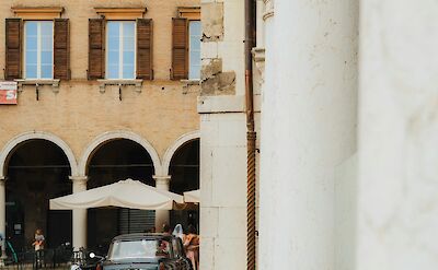 Old-fashioned car in Modena, Italy. Unsplash@Grigorii Shcheglov