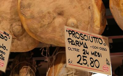 Parma ham for sale, Italy. Unsplash@Kseniia Zapiatkina