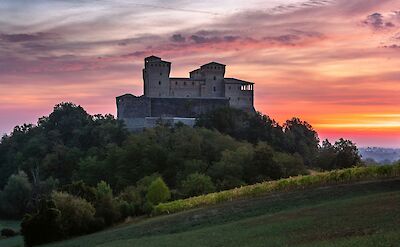 Sunrise at Torrechiara Castle, Emilia-Romagna, Italy. Unsplash@Samuele Bertoli