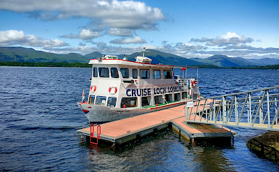 A ferry crosses Loch Lomond in Scotland. Flickr:Jean Balczesak 