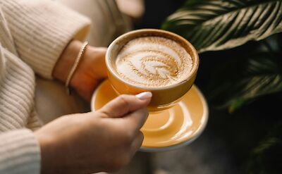 Warm cup of coffee. Unsplash:Lala Azizli