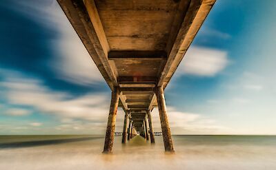 Under the pier, Deal, Kent, England. Unsplash:Zoltan Tasi