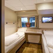 Two single beds cabin - Lower Deck | De Willemstad | Bike & Boat Tour