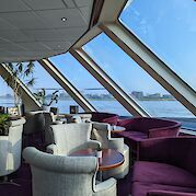 Lounge with large windows | SE-Manon | Bike & Boat Tour