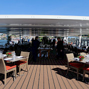 Partially covered sun deck on the Alva | Bike & Boat Tours