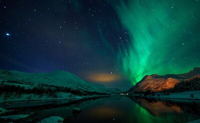 Northern Lights in Svolvaer, Lofoten Island, Norway. Flickr:Peter Edwards