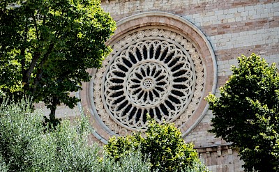 Church window in Assisi, Italy. Unsplash@Flora Orosz