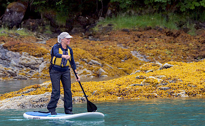 Stand up paddleboarding in Alaska. ©TO by Wolfgang Kaehler