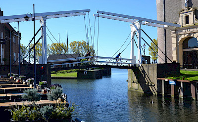 Biking the bridges of Friesland in the Netherlands. ©TO