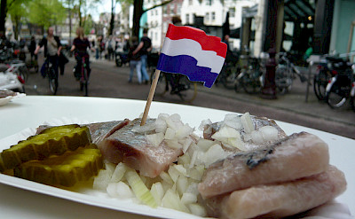 Herring with raw onions - a Dutch favorite! Flickr:WordRidden