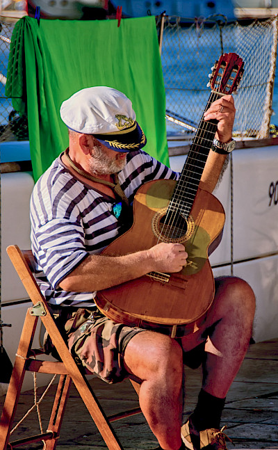 Sailor stringing a tune in Istria, Croatia. ©TO