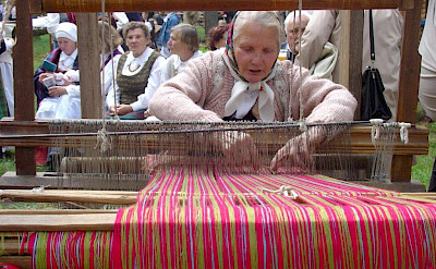 Women weaving at Dzūkija National Park in Lithuania.