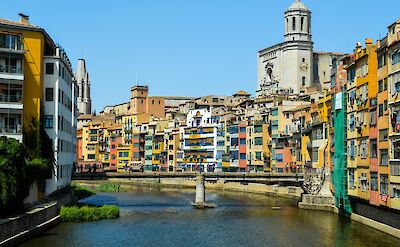 Colorful riverfront of Girona, Spain. Unsplash@Lucas Gallone