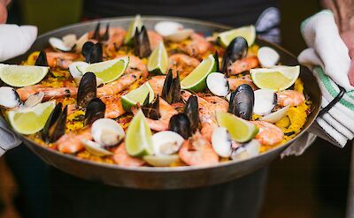 Seafood paella with lime. Unsplash@Kaitlin Dowis