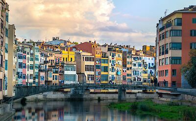 Sunlit clouds over Girona, Spain. Unsplash@David Vives