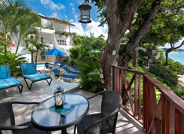 Merlin Bay Ocean Edge Dec Sitting Area By Sea