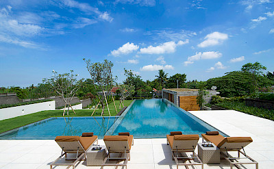 The Iman Villa Sunloungers By The Pool