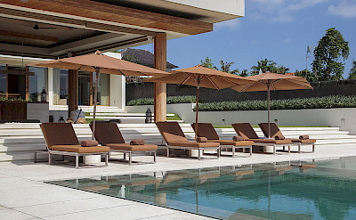The Iman Villa Sun Loungers By The Pool